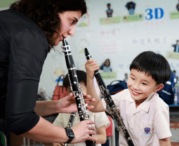 nurturing open hearts clarinet kid smiling