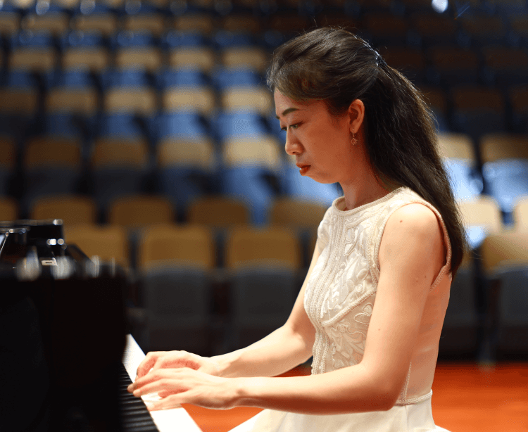 thinking beyond music girl playing piano portrait