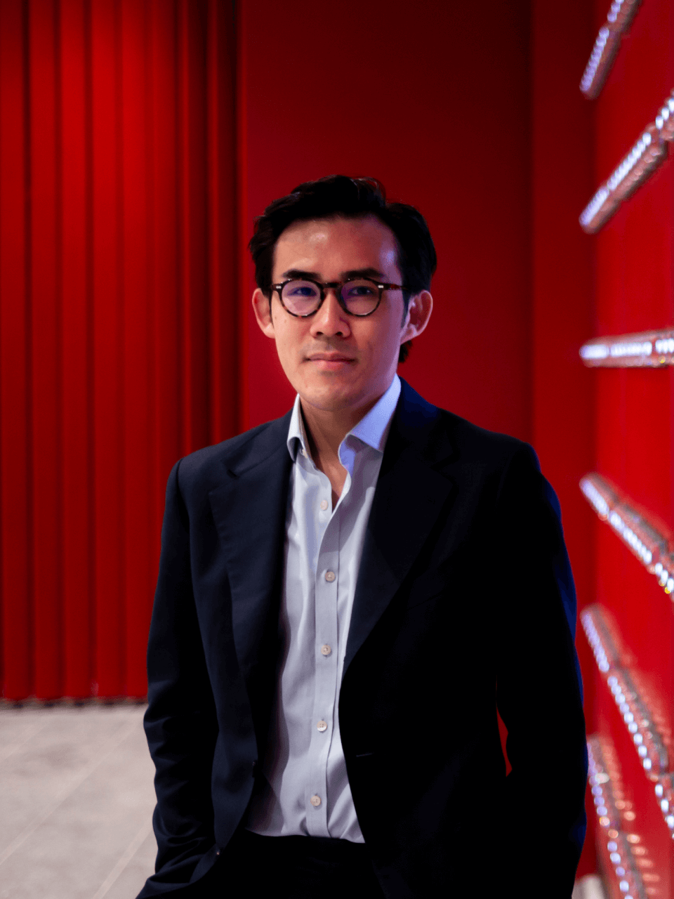 dr wong holds phd portrait image
