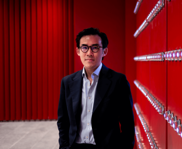 dr wong holds phd portrait image