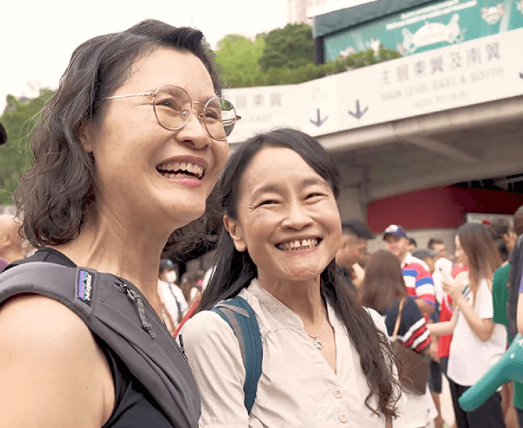 close up of two woman smiling