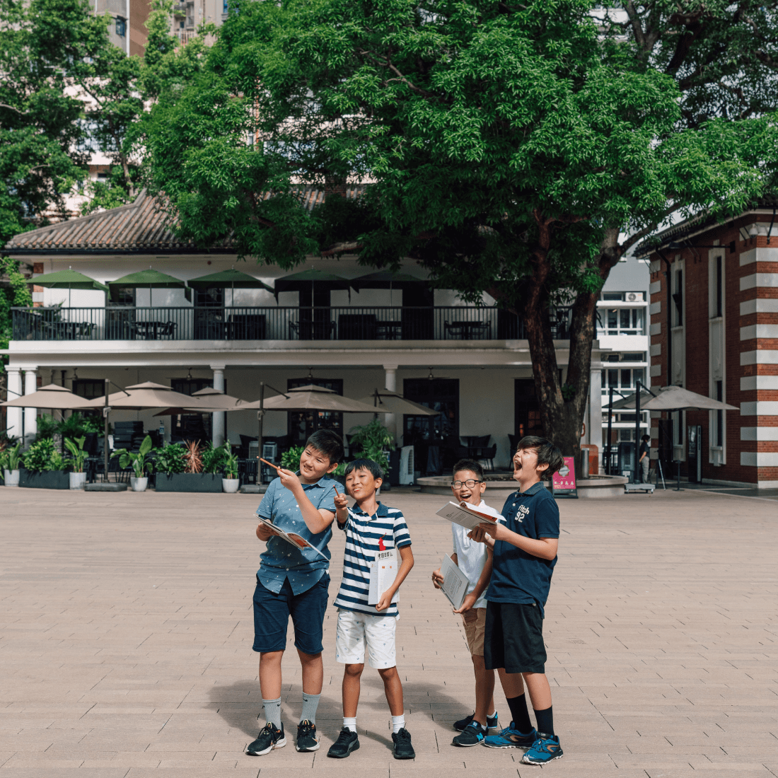 tk plaza children green trees portrait
