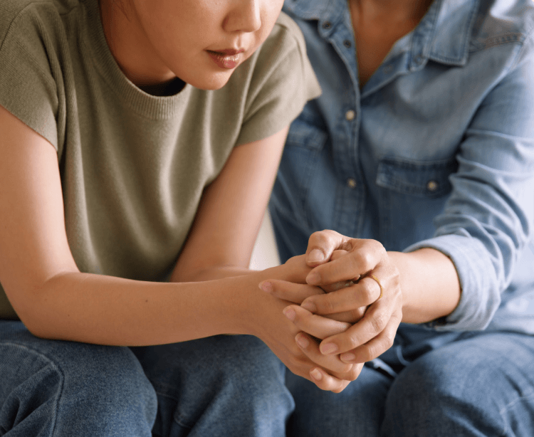 mental health holding hands
